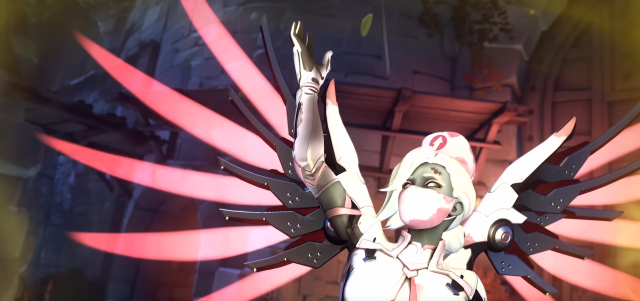 Le nouveau skin de Mercy sur le thème d'Halloween dans la saison 7 d'Overwatch 2. Elle est habillée comme une infirmière zombie avec des ailes roses.